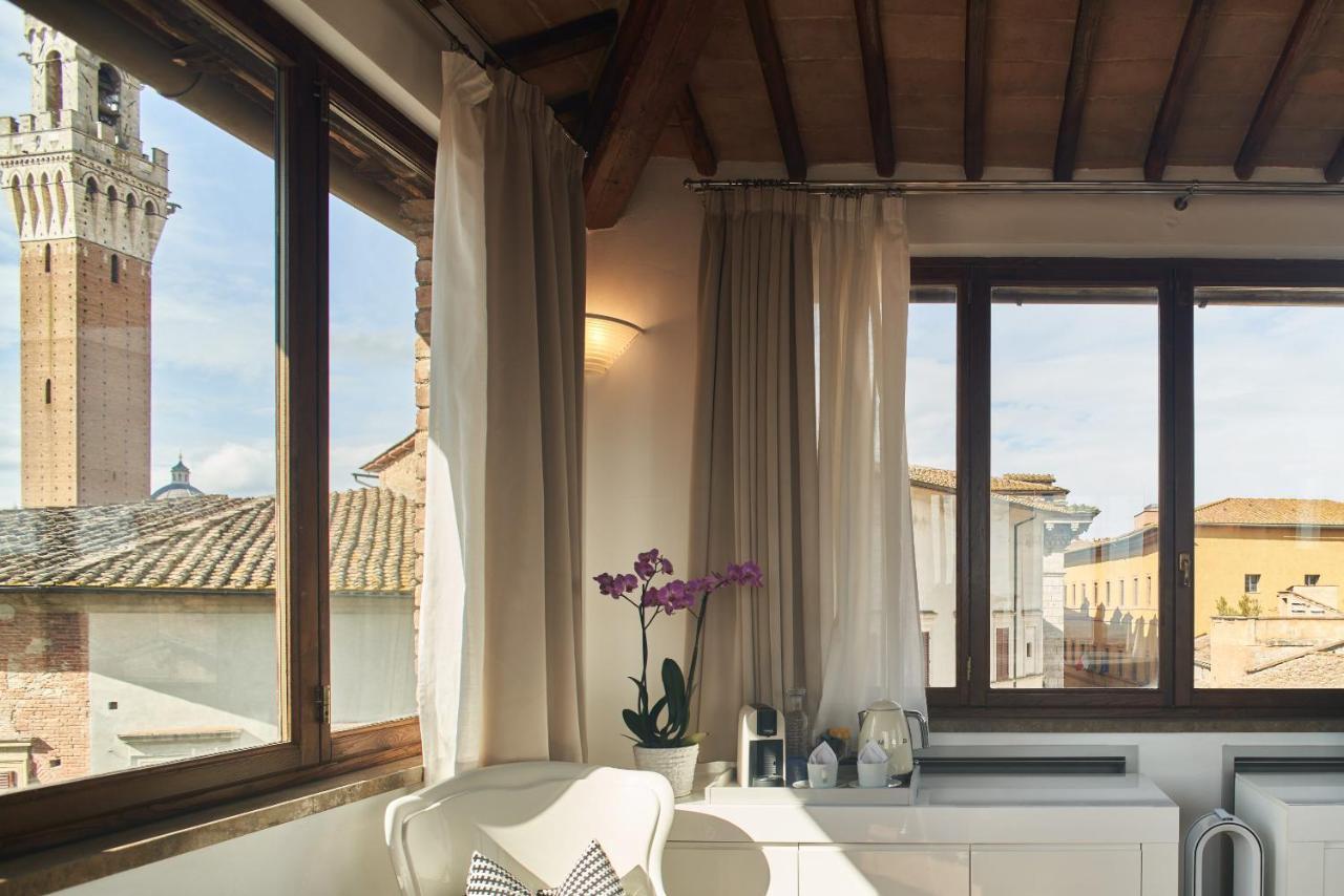 B&B Le Logge Luxury Rooms Siena Bagian luar foto